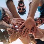 excited-friends-holding-hands-together-2026-01-09-08-36-57-utc